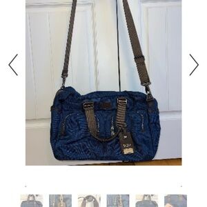 Blue and Brown Duffel Bag with Leather Trim and Contrast Stitching